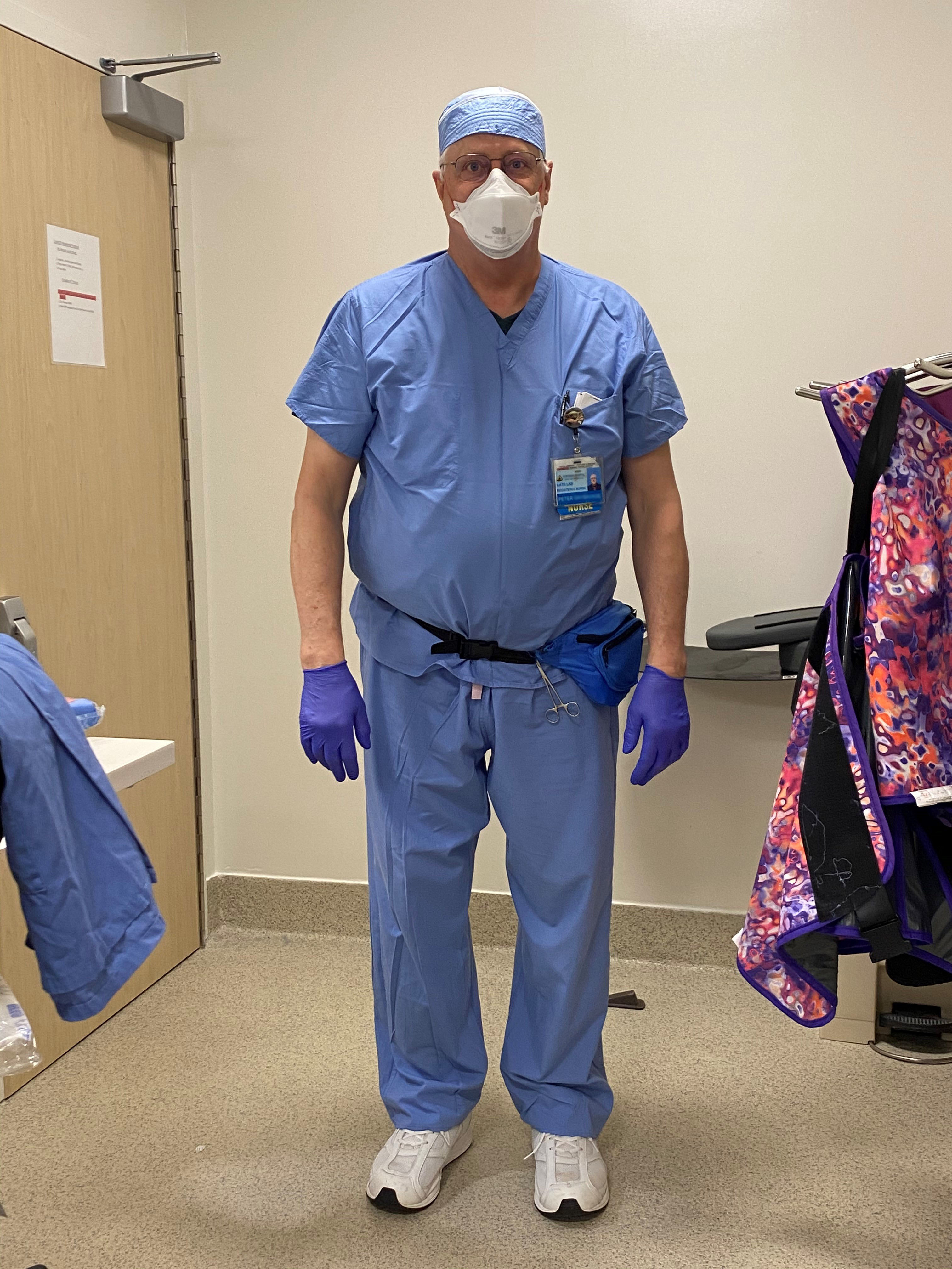 Peter From Demascus, MD in his Nurse Scrubs